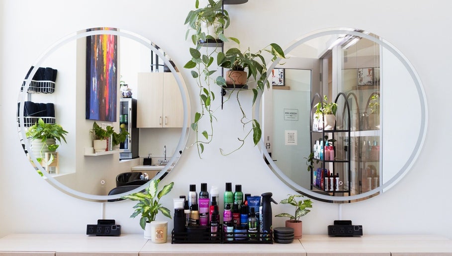 Modern salon with plants and beauty products at Hidden Gem Hair by Marie-Eve Faucher, Toronto, Ontario, CA.