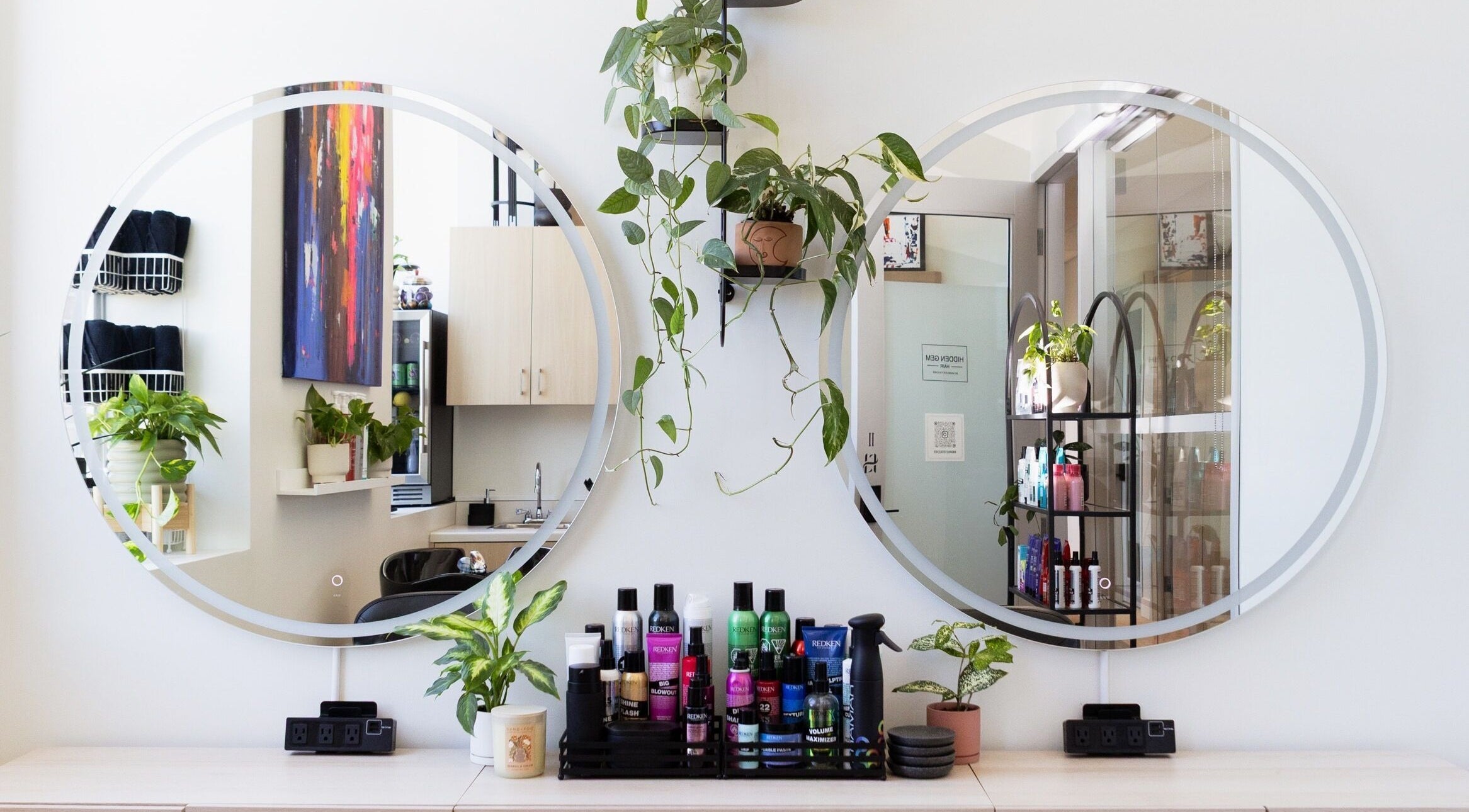 Modern salon with plants and beauty products at Hidden Gem Hair by Marie-Eve Faucher, Toronto, Ontario, CA.