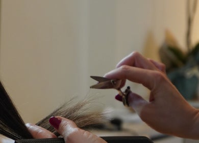 Close-up of a haircut at The Luxe Hair Spa, Barcelona, Catalunya, ES showcasing precision and skill.
