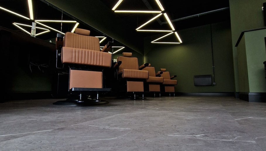 Modern barber chairs at BarberHouse44, Letterkenny, County Donegal, IE, showcasing sleek, stylish design.