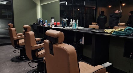 Elegant barber chairs at BarberHouse44, Letterkenny, County Donegal, IE, showcasing a professional grooming setup.
