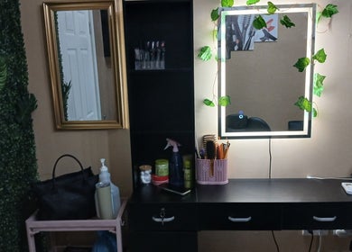 Elegant beauty station at Infinite Finesse by Chanel, Saint George's, Saint George, GD, featuring lush decor.