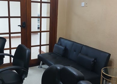 Inviting lounge at Infinite Finesse by Chanel in Saint George's, Saint George, GD.