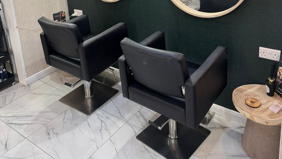 Elegant salon chairs at Alex Jamieson Hairdressing, Knottingley, England, GB create a modern and inviting atmosphere.