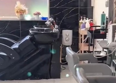 Chic hairdressing area at Alex Jamieson Hairdressing, Knottingley, England, GB, showcasing state-of-the-art washbasins.
