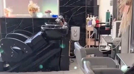 Chic hairdressing area at Alex Jamieson Hairdressing, Knottingley, England, GB, showcasing state-of-the-art washbasins.