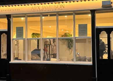 Exterior of Alex Jamieson Hairdressing in Knottingley, England, GB, showcasing the salon's inviting ambiance.