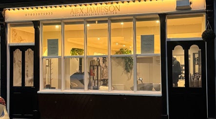 Exterior of Alex Jamieson Hairdressing in Knottingley, England, GB, showcasing the salon's inviting ambiance.