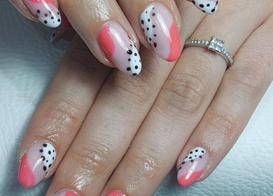 Stylish dotted and pink nail art at Chloe Cross Nail Artist, Barnsley, England, GB.