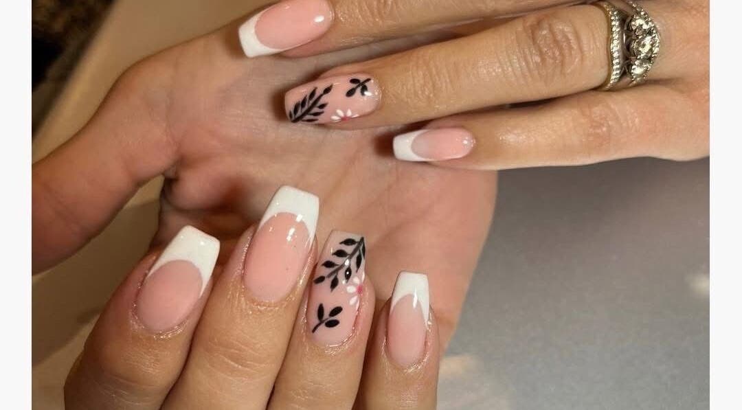 Elegant nail design with floral art at Glamour Aesthetix, Boksburg, Gauteng, ZA.