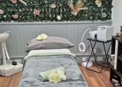Peaceful treatment room at Simply Luxe Beauty, Coatbridge, Scotland, GB, with lush decor and cozy setup.