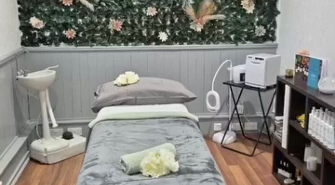 Peaceful treatment room at Simply Luxe Beauty, Coatbridge, Scotland, GB, with lush decor and cozy setup.