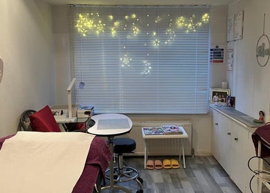 Cozy treatment room at Delight Laser Spa, New Barnet, England, featuring soft lighting and relaxation space.
