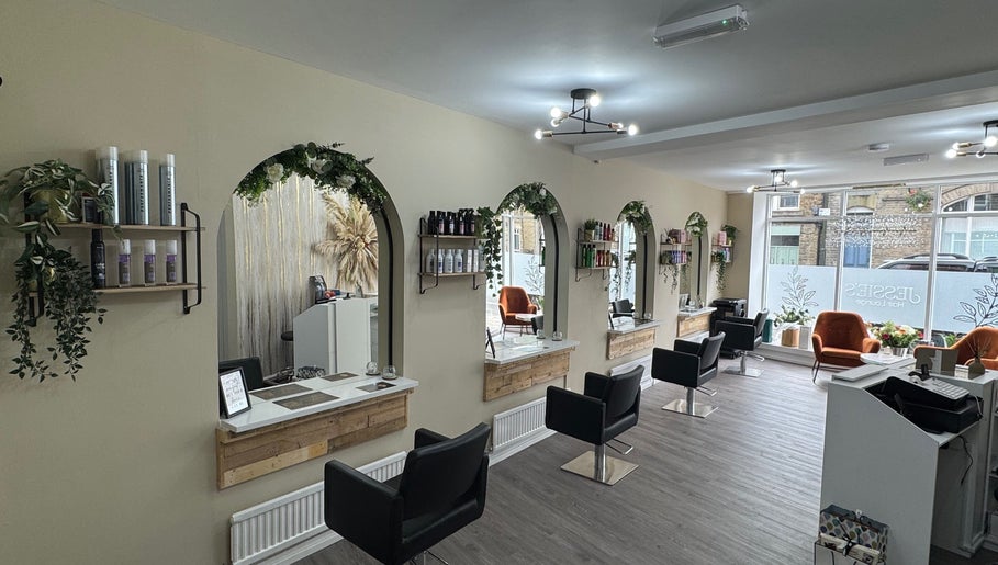 Bright, inviting Jessie’s Hair Lounge interior in Whaley Bridge, England, GB with modern decor and styling stations.