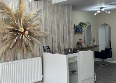 Elegant salon decor at Jessie's Hair Lounge in Whaley Bridge, England, GB showcasing chic interiors and pamper corner.