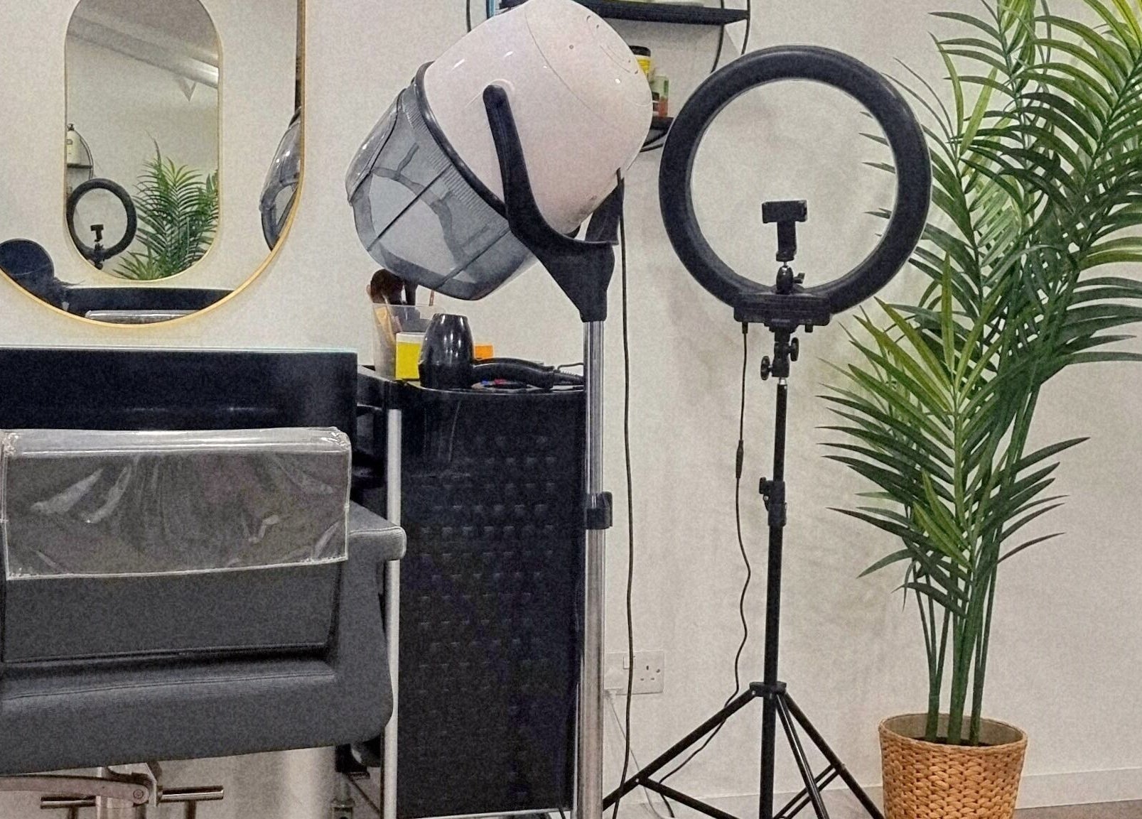 Salon chair and equipment at Devinerootz Salon, Grays, England, GB. Modern and stylish beauty workspace.