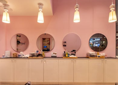 Elegant interior at Exquisite Brows and Spa Liverpool, Liverpool, New South Wales, AU with chic mirrors and lighting.