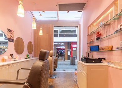 Chic salon interior at Exquisite Brows and Spa Warringah Mall, Brookvale, New South Wales, AU. Elegant decor and seating.