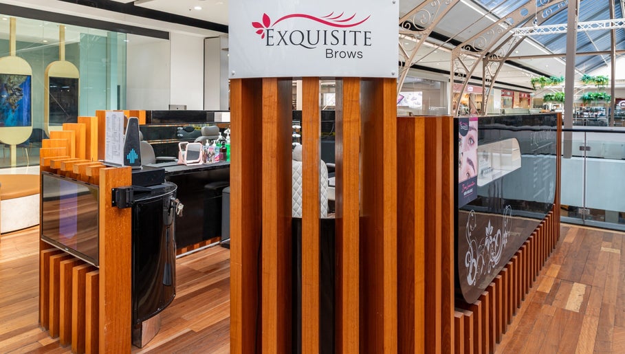 Interior view of Exquisite Brows and Spa Broadway, Glebe, New South Wales, AU showcasing modern wooden decor.