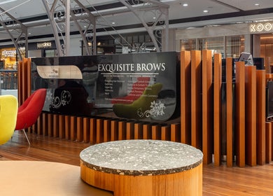Interior of Exquisite Brows and Spa Broadway, Glebe, New South Wales, AU with stylish seating and decor.