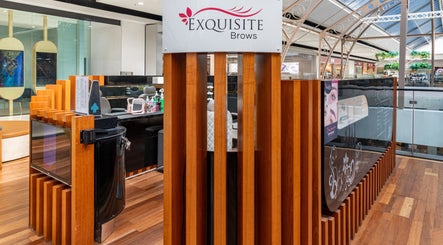 Interior of Exquisite Brows and Spa Broadway in Glebe, New South Wales, AU showcases elegant wooden accents.