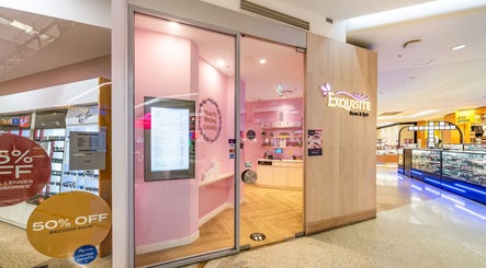 Entrance of Exquisite Brows and Spa in Bankstown, New South Wales, AU, showcasing a stylish pink interior.