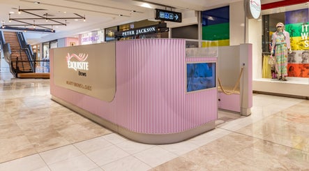 Exquisite Brows Hurstville salon interior in Hurstville, New South Wales, AU. Elegant pink design in shopping center.