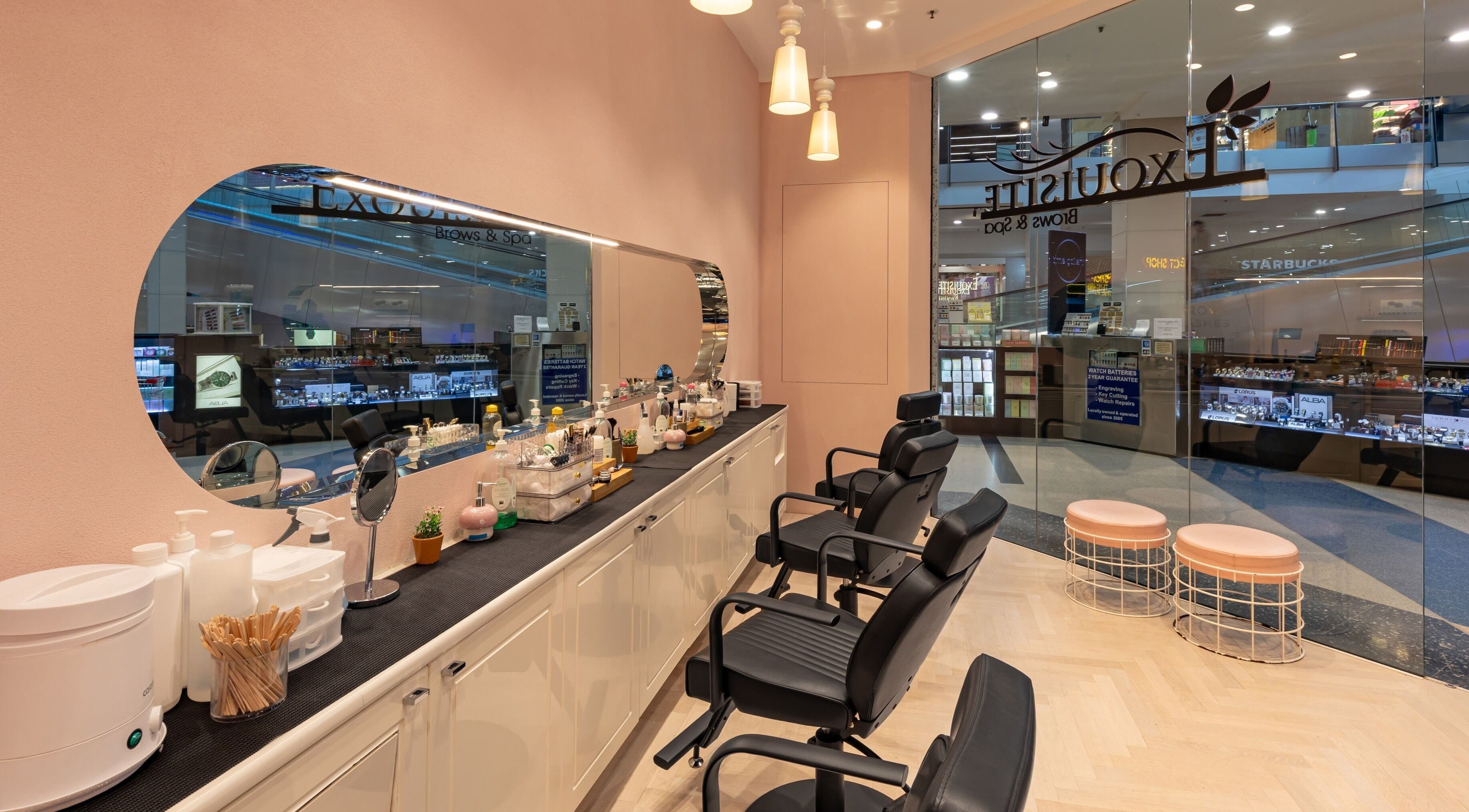 Exquisite Brows Eastgardens interior shows sleek styling stations in Eastgardens, New South Wales, AU.