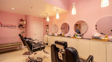 Elegant beauty chairs at Exquisite Brows and Spa Liverpool, New South Wales, AU with soft pink decor.