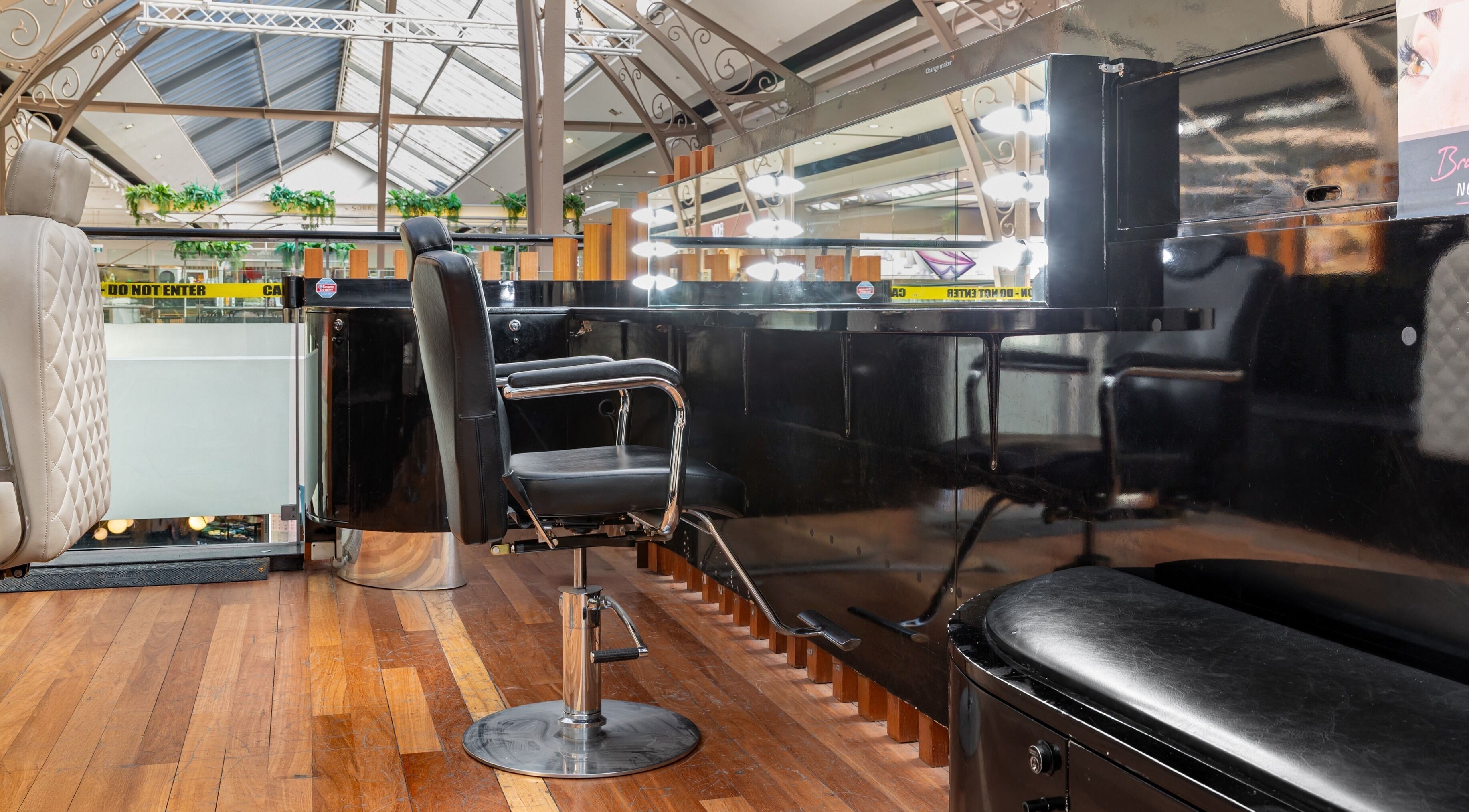 Exquisite Brows and Spa Broadway's stylish salon area in Glebe, New South Wales, AU with elegant decor and seating.