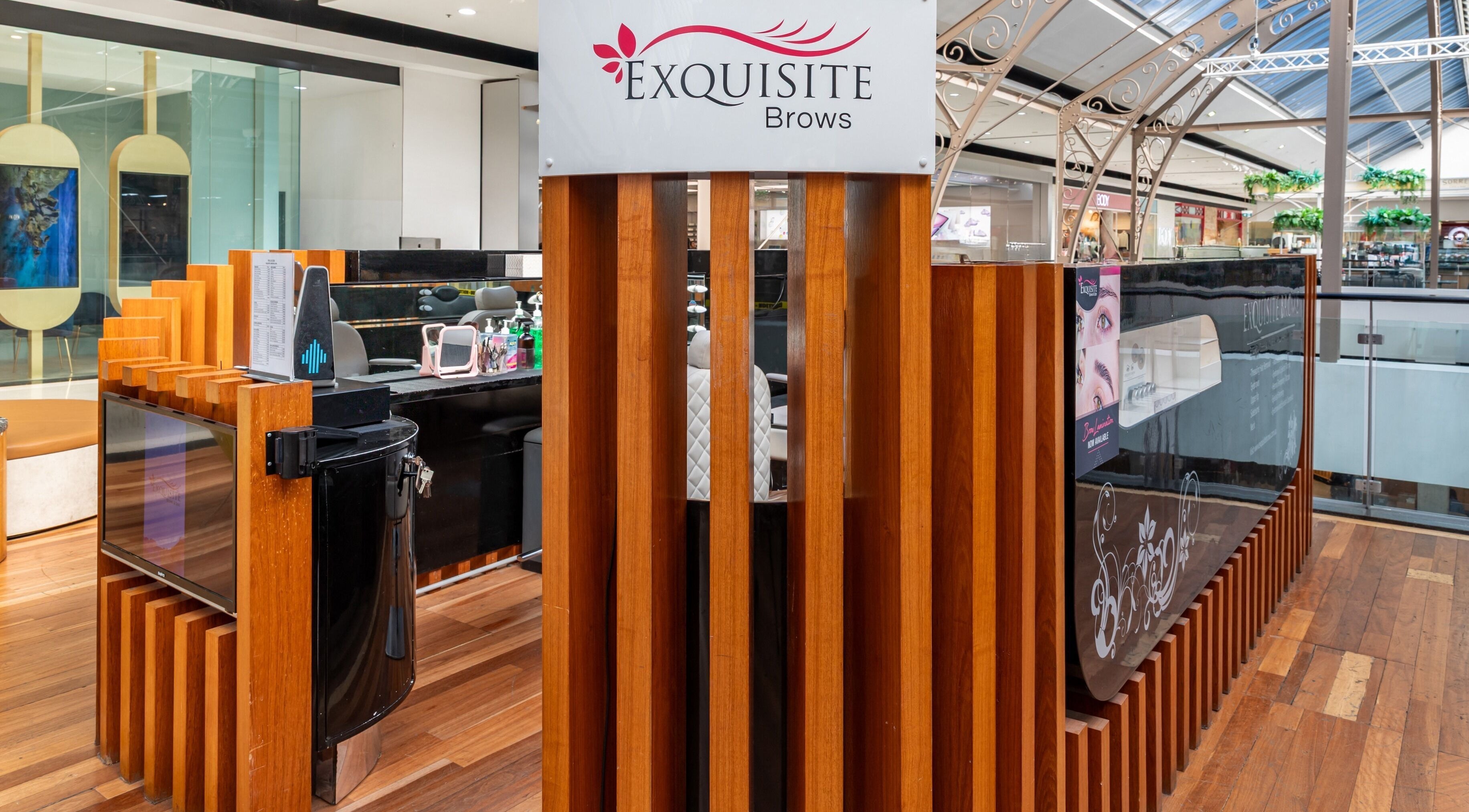 Modern Exquisite Brows and Spa Broadway in Glebe, New South Wales, AU featuring elegant wood panel design.