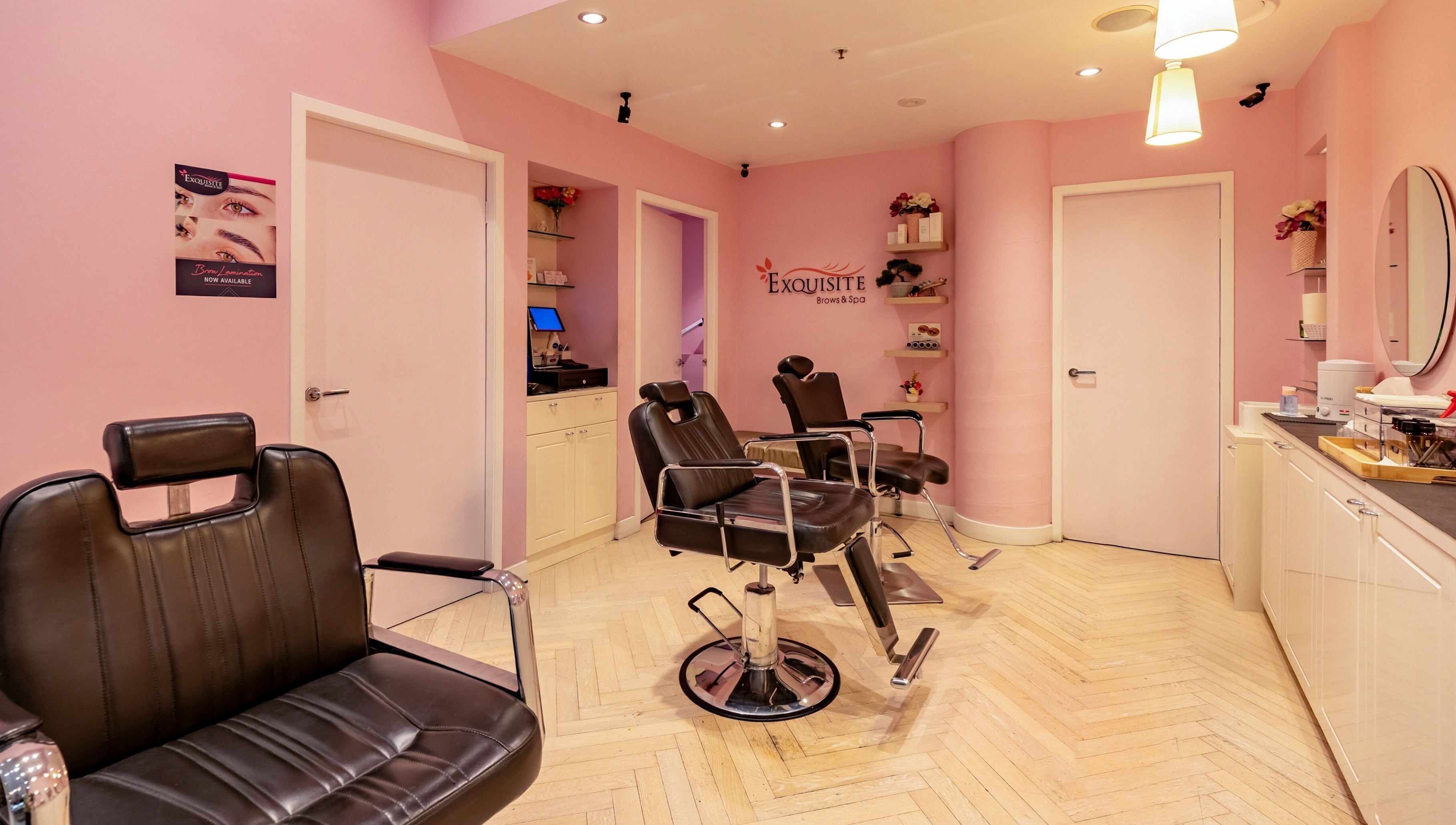Chic interior of Exquisite Brows and Spa Liverpool in Liverpool, New South Wales, AU with stylish salon chairs.