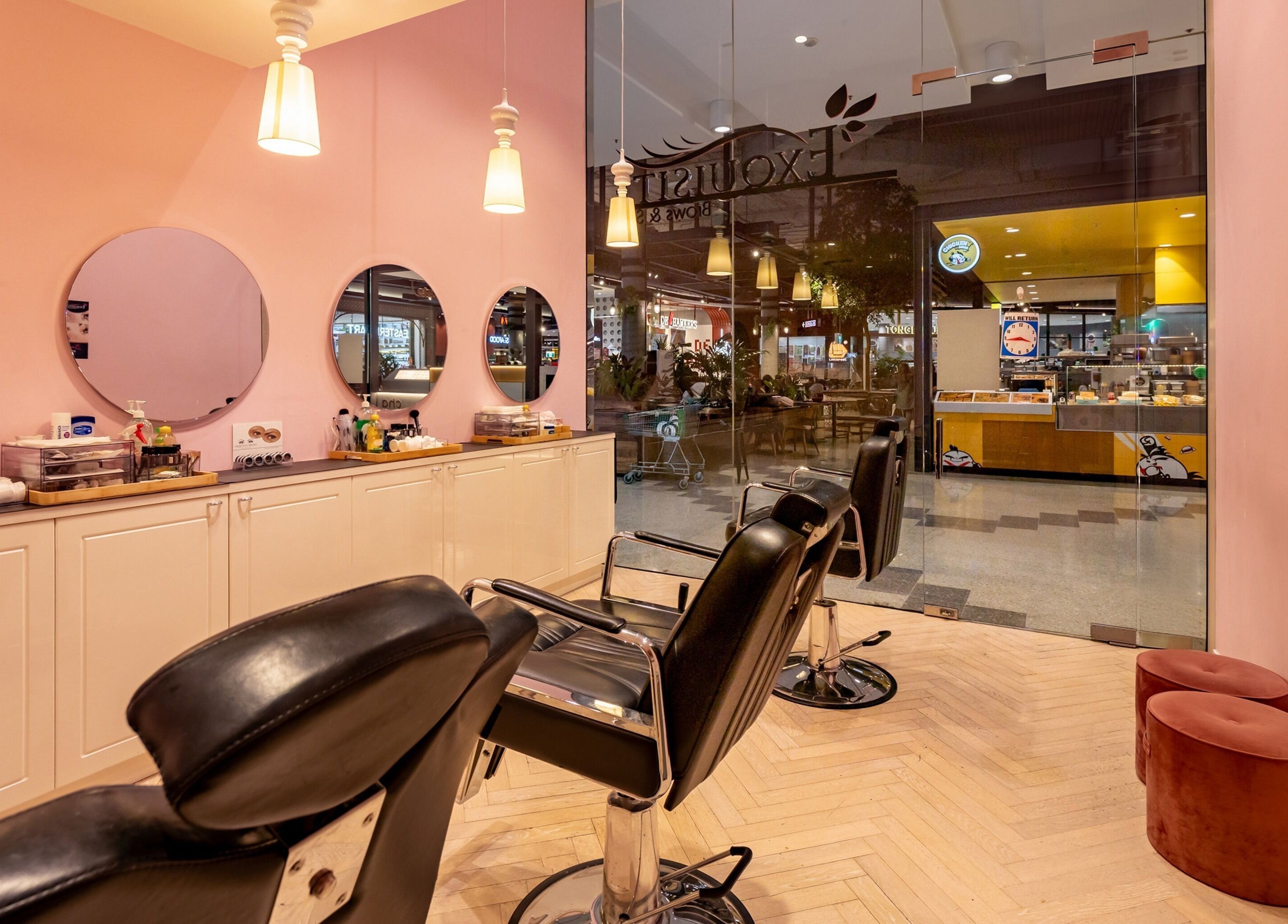 Elegant salon chairs and mirrors at Exquisite Brows and Spa Liverpool, New South Wales, AU.