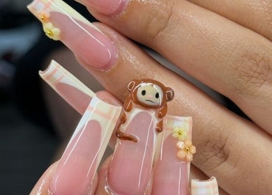 Custom monkey-themed nail art at Nailzbybrenisbel, Rockville, Maryland, US, showcasing intricate design.