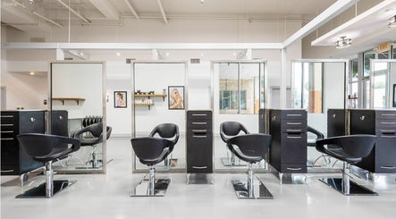 Modern salon interiors at Mark Yared Hair Stylist in Austin, Texas, US featuring sleek styling chairs and mirrors.
