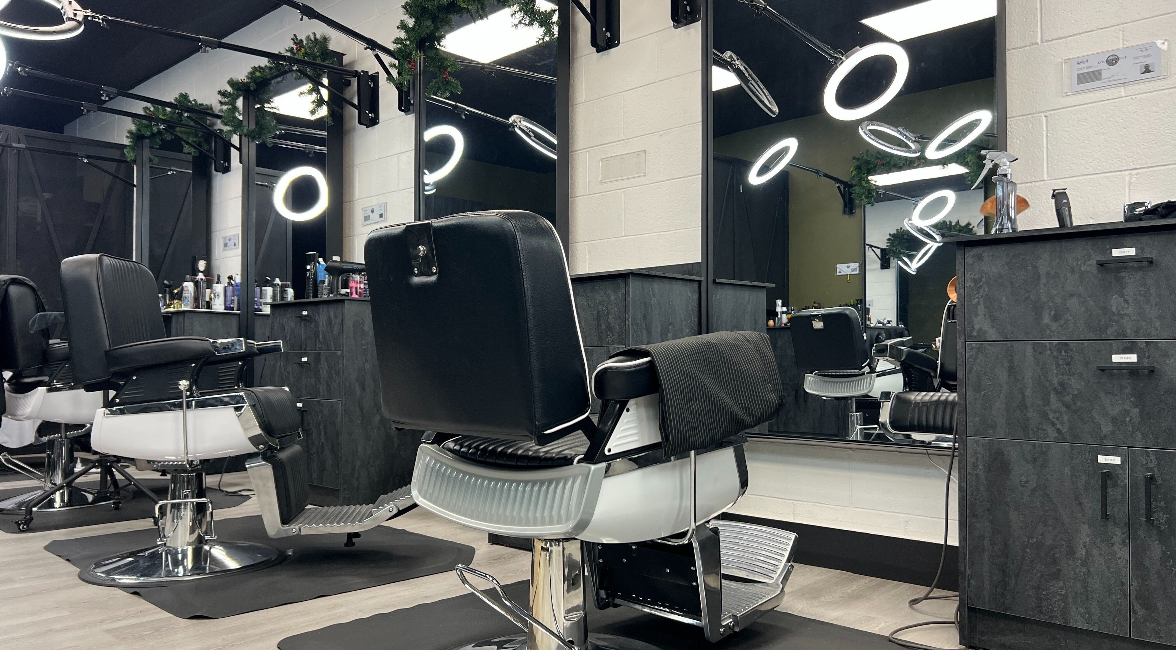 Modern barber chair setup at Barber Egor in Los Angeles, California, US with elegant lighting.