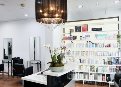 Chic salon interior at Imaj For Hair, Gympie QLD, Queensland, AU, featuring beauty products and styling stations.