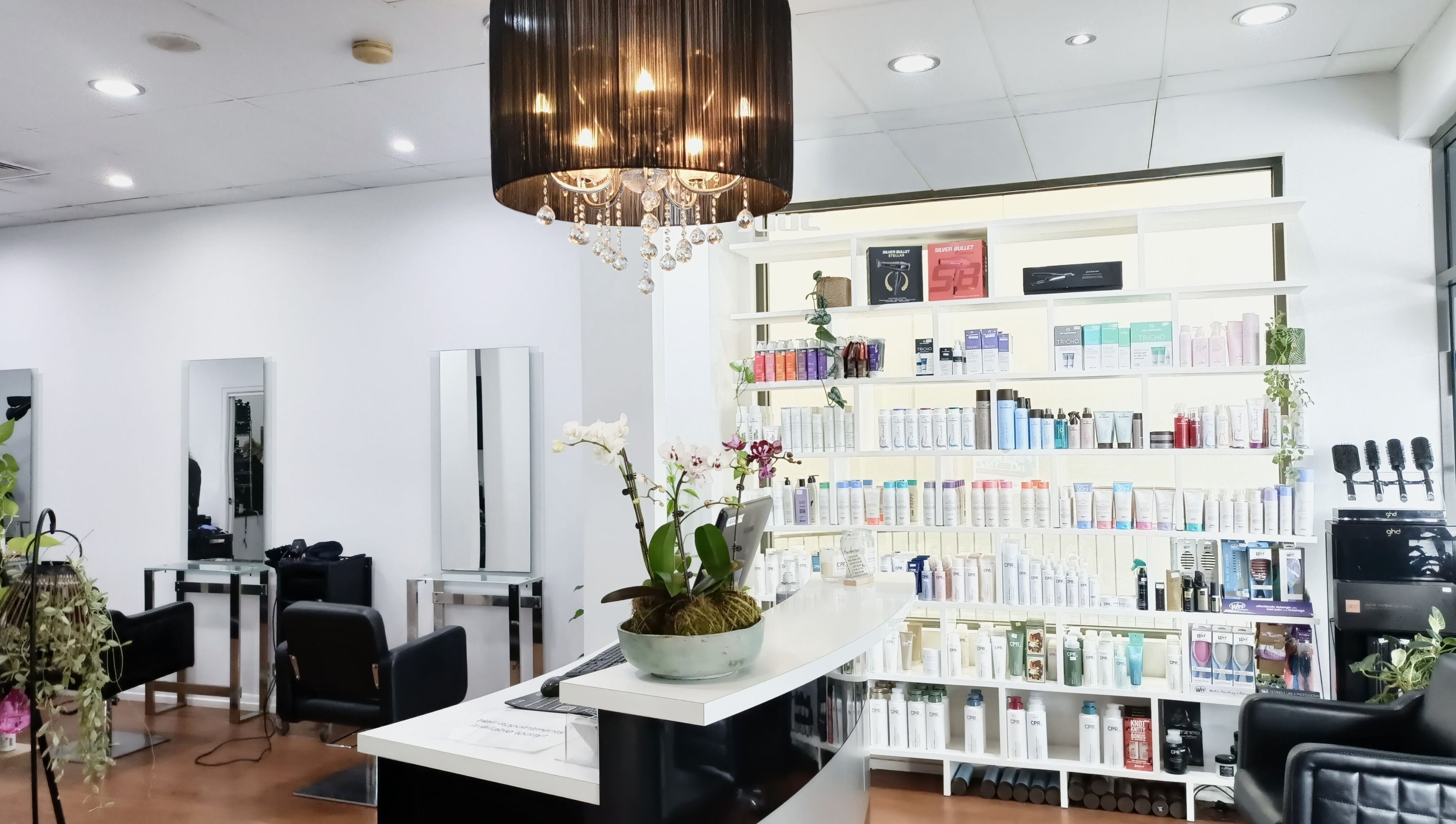 Chic salon interior at Imaj For Hair, Gympie QLD, Queensland, AU with modern decor and product display.