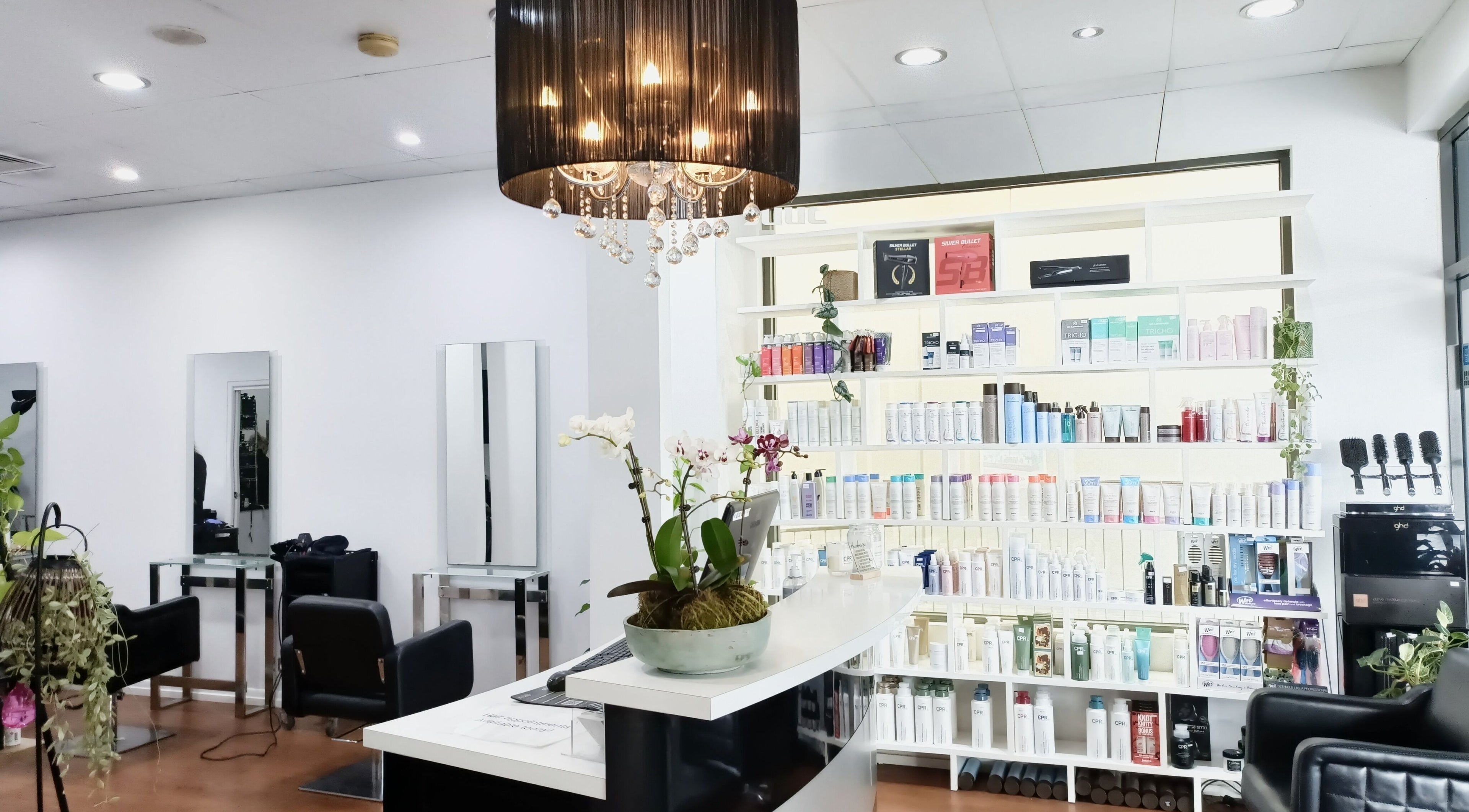 Chic salon interior at Imaj For Hair, Gympie QLD, Queensland, AU with modern decor and product display.