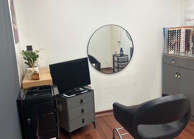 Cozy salon corner at Mohit hairdresser, Gosnells, Western Australia, AU with modern decor and styling tools.