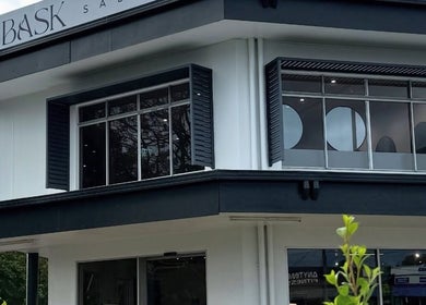Modern exterior of Hair with Amiee in Manoora, Queensland, AU, showcasing stylish window designs.