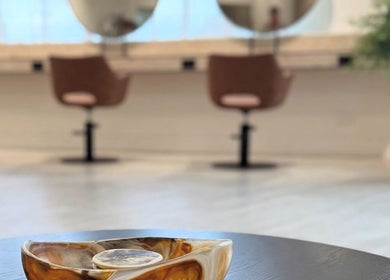Elegant salon interior at Hair with Amiee, Manoora, Queensland, AU. Modern chairs and minimalist decor.