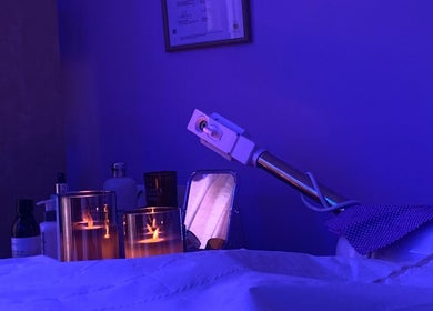 Relaxing ambiance at SIESTA7 spa in Nottingham, England, GB, featuring candles and wellness equipment.