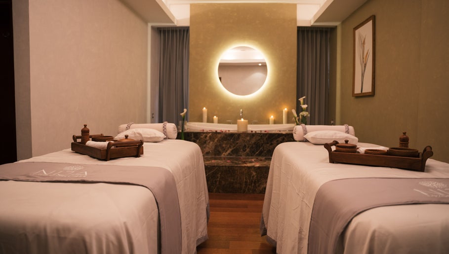 Elegant spa treatment room at NIja Luxury Wellness, Colombo, Western Province, LK, with twin massage beds.
