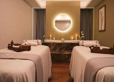 Elegant spa treatment room at NIja Luxury Wellness, Colombo, Western Province, LK, with twin massage beds.