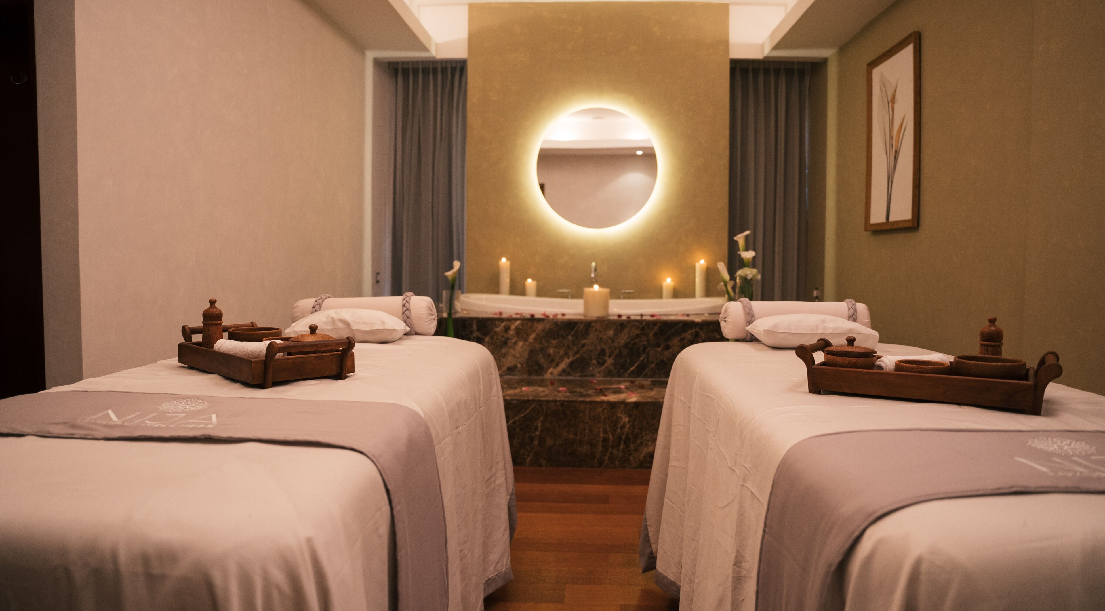 Elegant spa treatment room at NIja Luxury Wellness, Colombo, Western Province, LK, with twin massage beds.