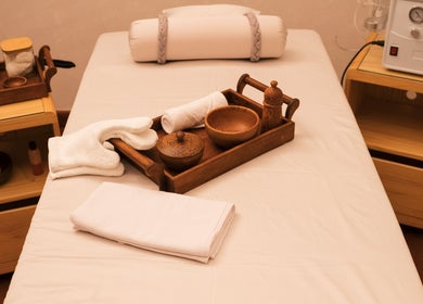 Tranquil spa setup at NIja Luxury Wellness, Colombo, Western Province, LK featuring a massage table and amenities.