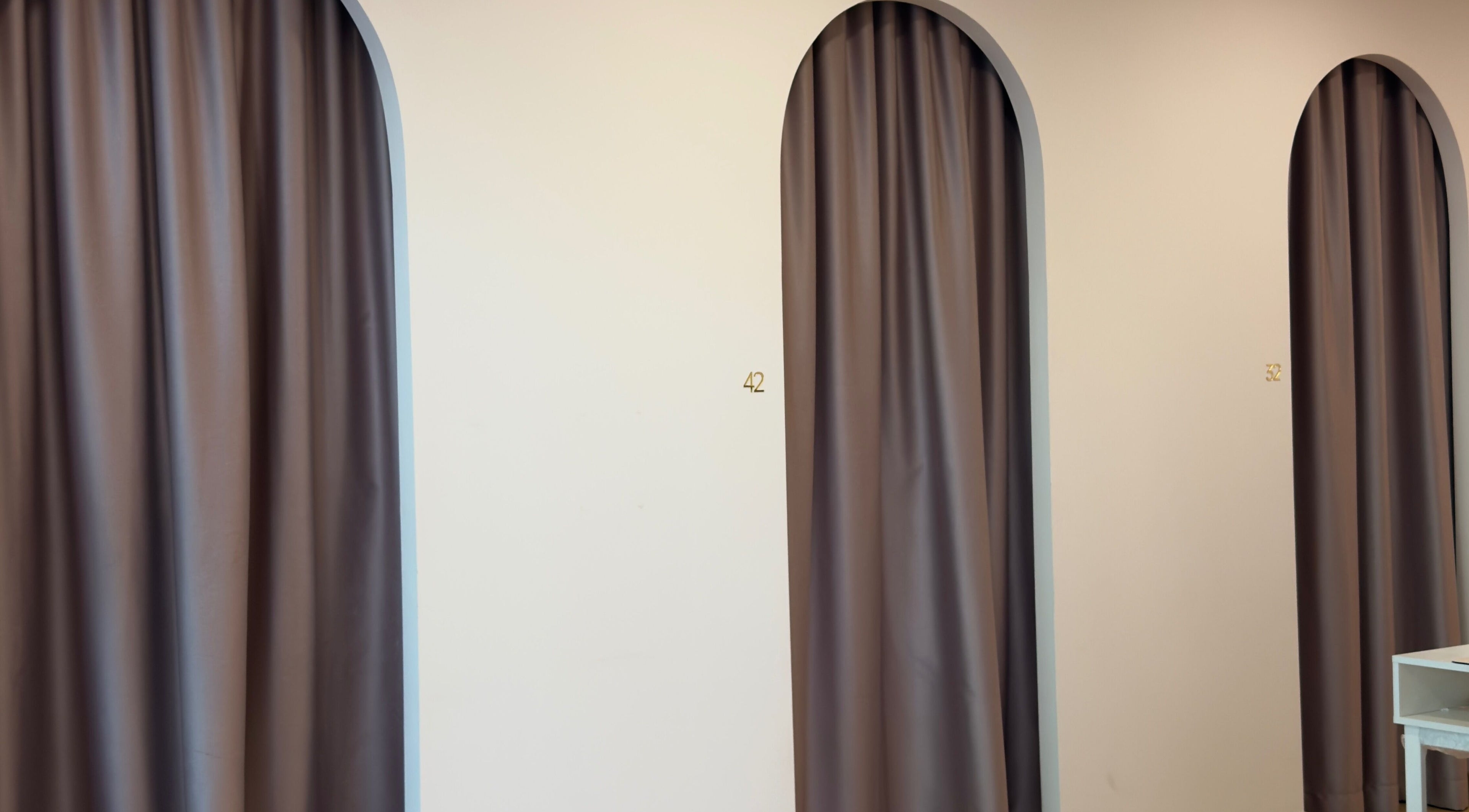 Elegant curtained archways at WAXING BY GIRL ENTERPRISE in Petaling Jaya, Selangor, MY providing privacy for clients.