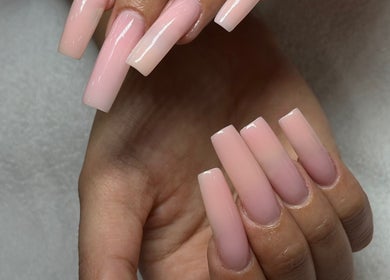 Elegant pink nails showcased at Studio Giulia in Zürich, CH, highlighting beauty and style.