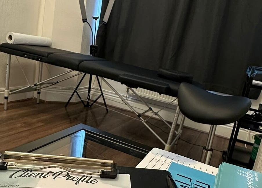 Therapy table and client profile setup at Studio 88, Cardiff, Wales, GB.